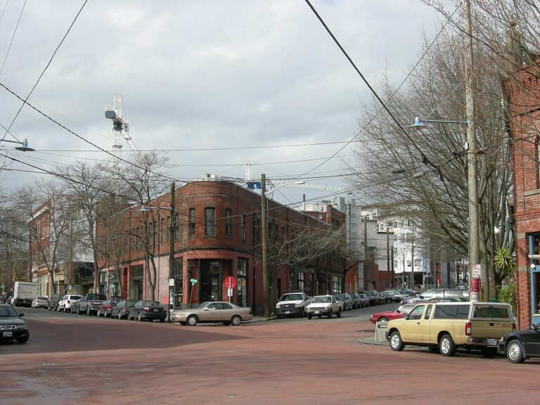 Brick corner building and storefronts along Ballard Avenue