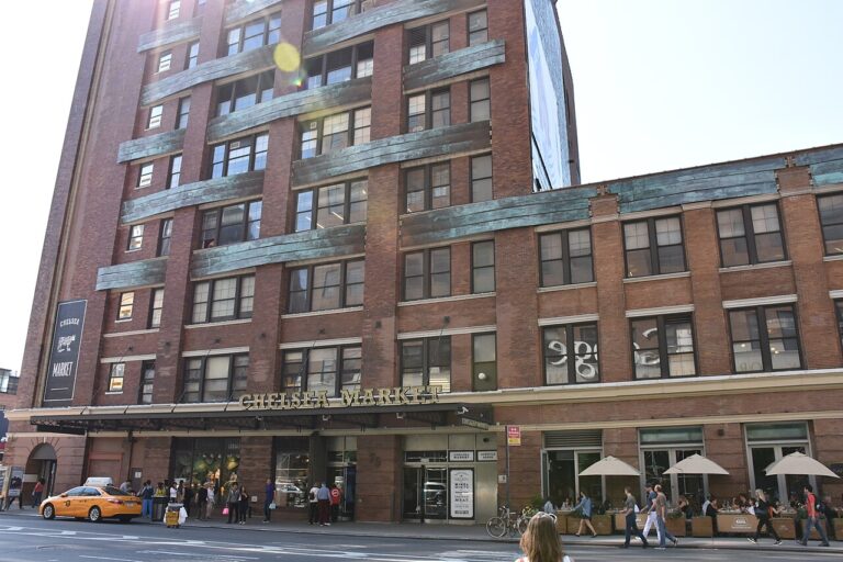 Brick exterior and street entrance of Chelsea Market in Manhattan
