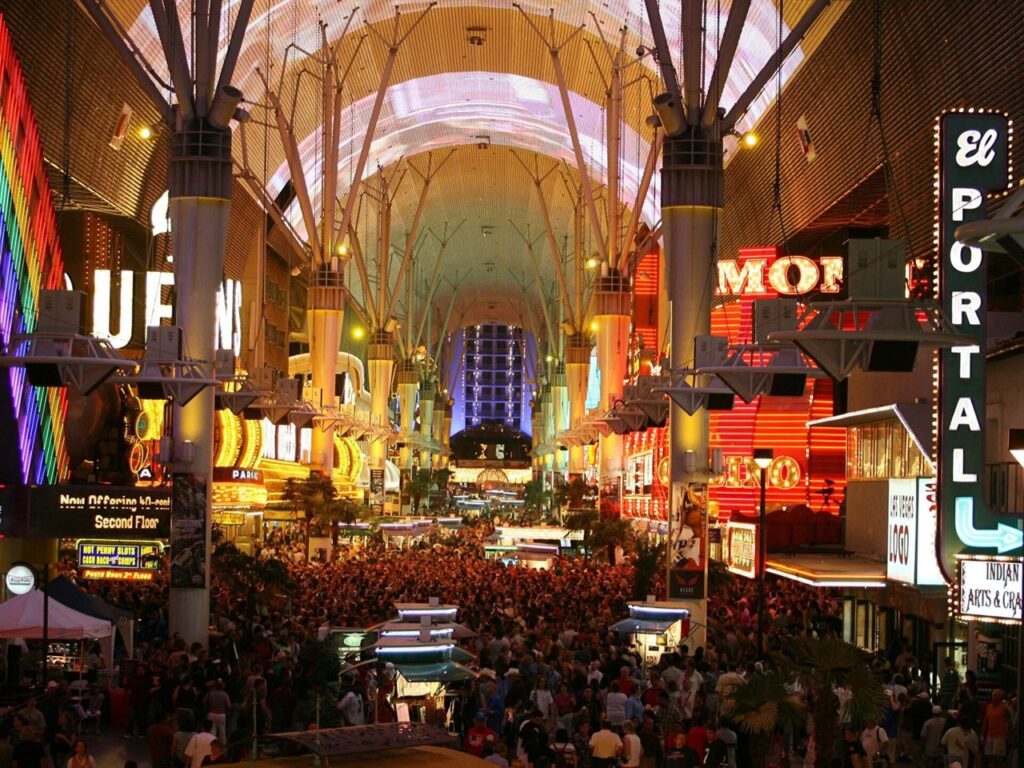 Crowds beneath the illuminated Fremont Street Experience canopy