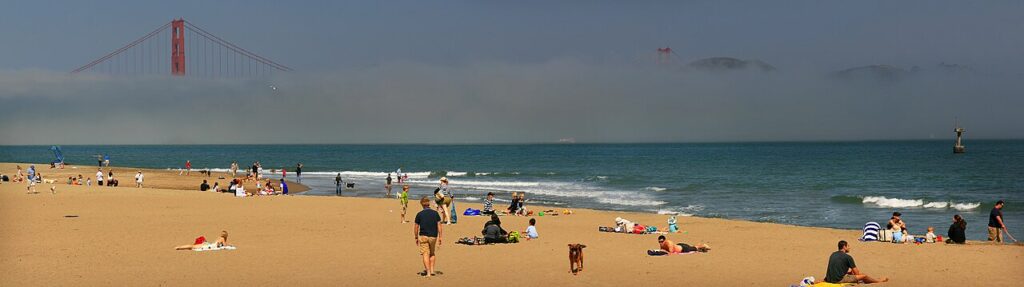 Crissy Field beach with the Golden Gate Bridge in the distance
