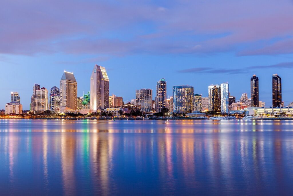 San Diego skyline reflected in the bay at dusk from Coronado