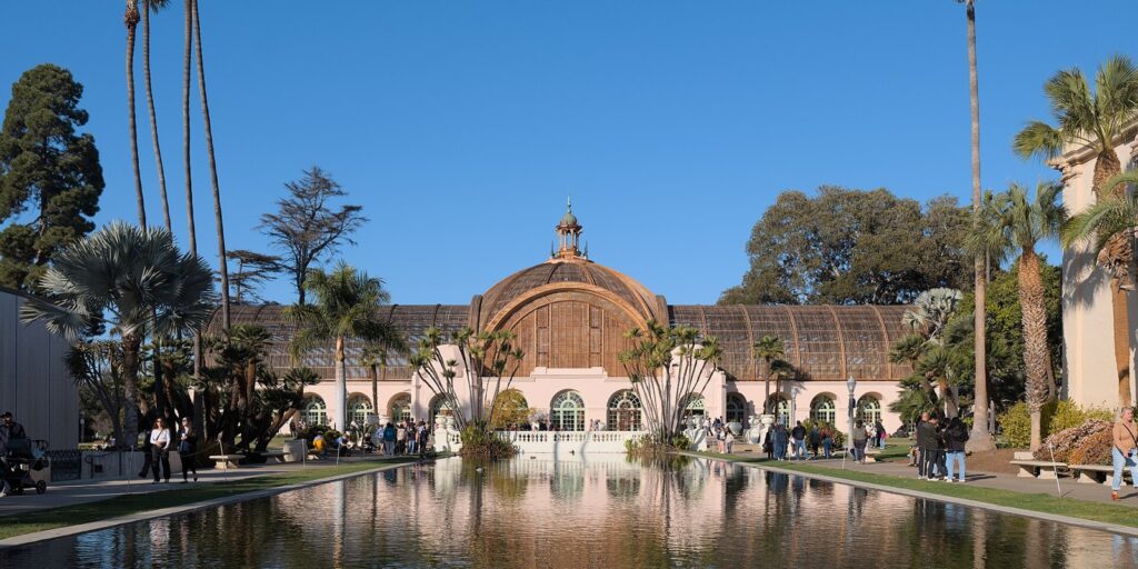 Balboa Park Botanical Building reflected in its lily pond