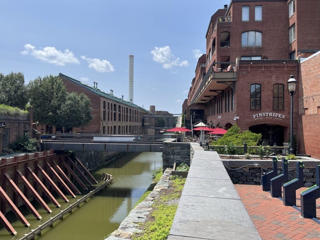 Chesapeake and Ohio Canal beside brick buildings in Georgetown